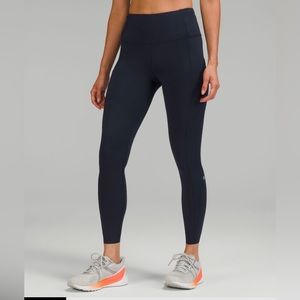 Lululemon fast and free high rise 25’ tight in navy -size 6